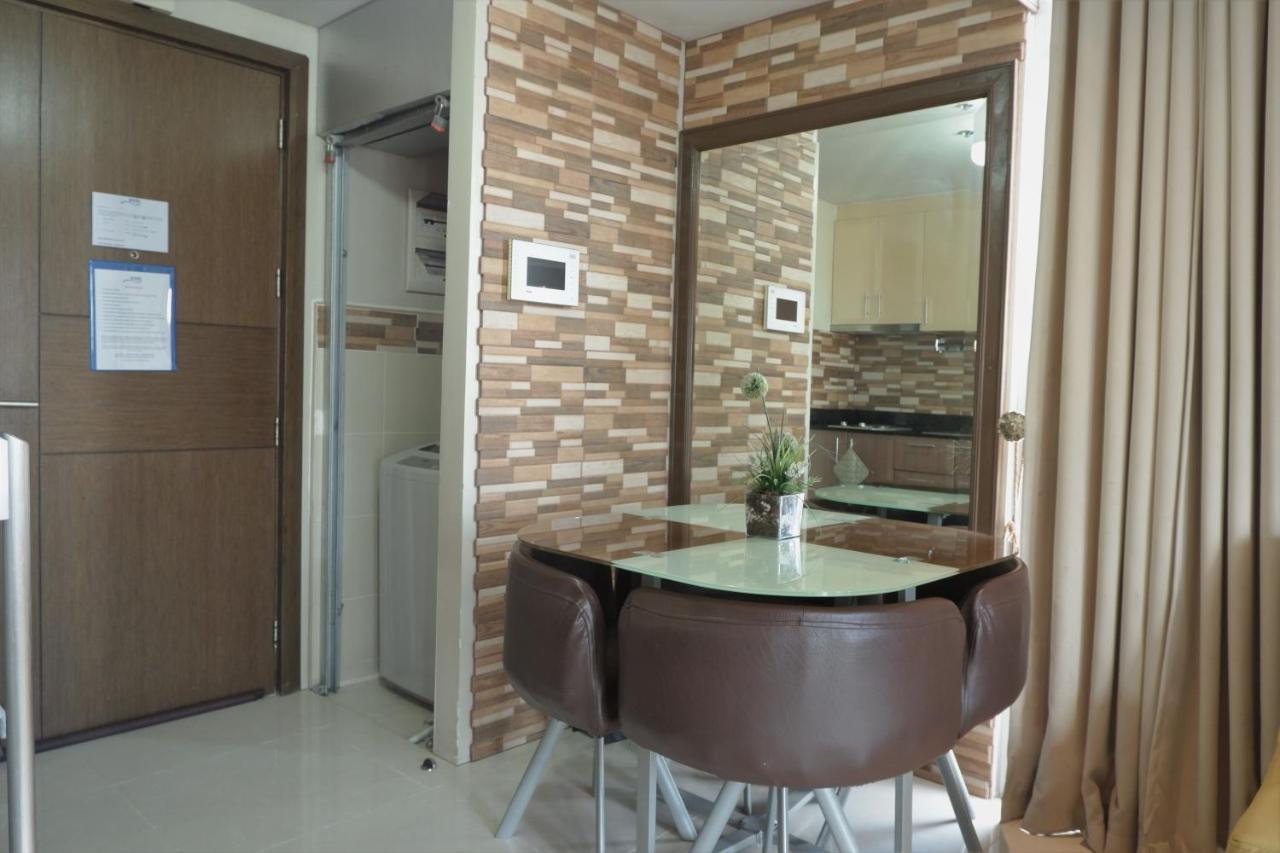 One Palm Tree Villas Manila Bagian luar foto